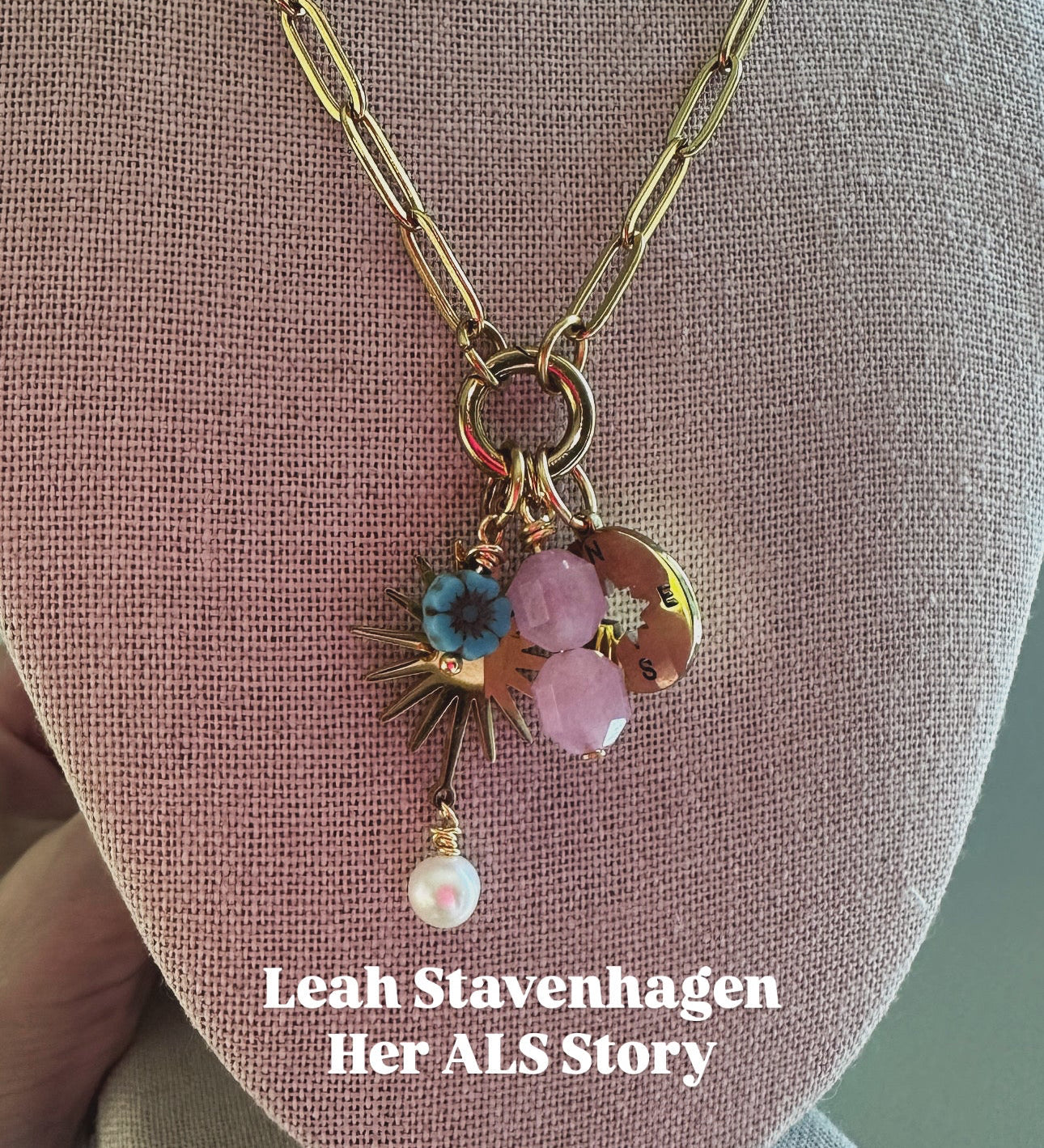 Necklace with floral charm on a mannequin bust, featuring 'Leah Stavenhagen Her ALS Story'.