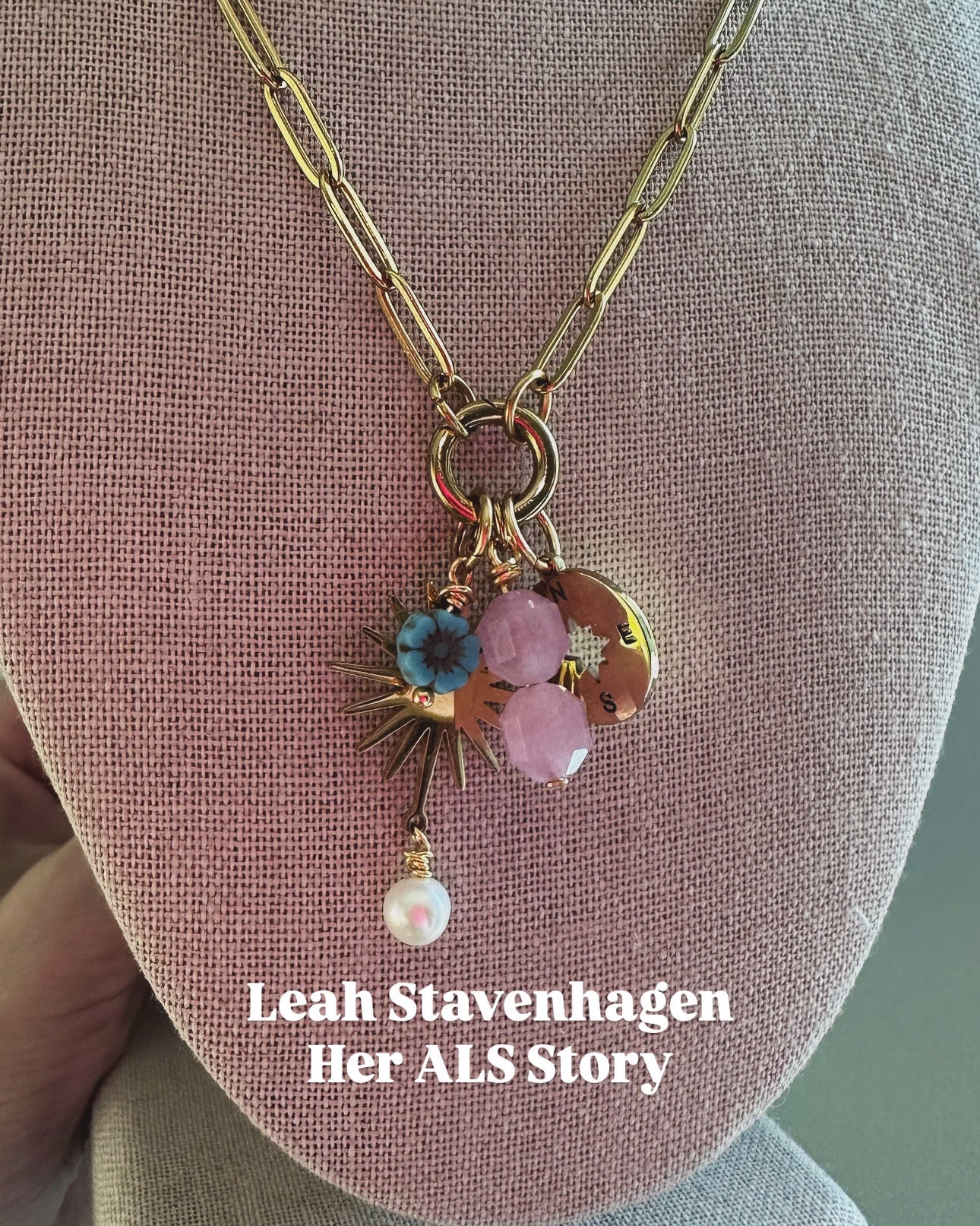 Necklace with floral charm on a mannequin bust, featuring 'Leah Stavenhagen Her ALS Story'.