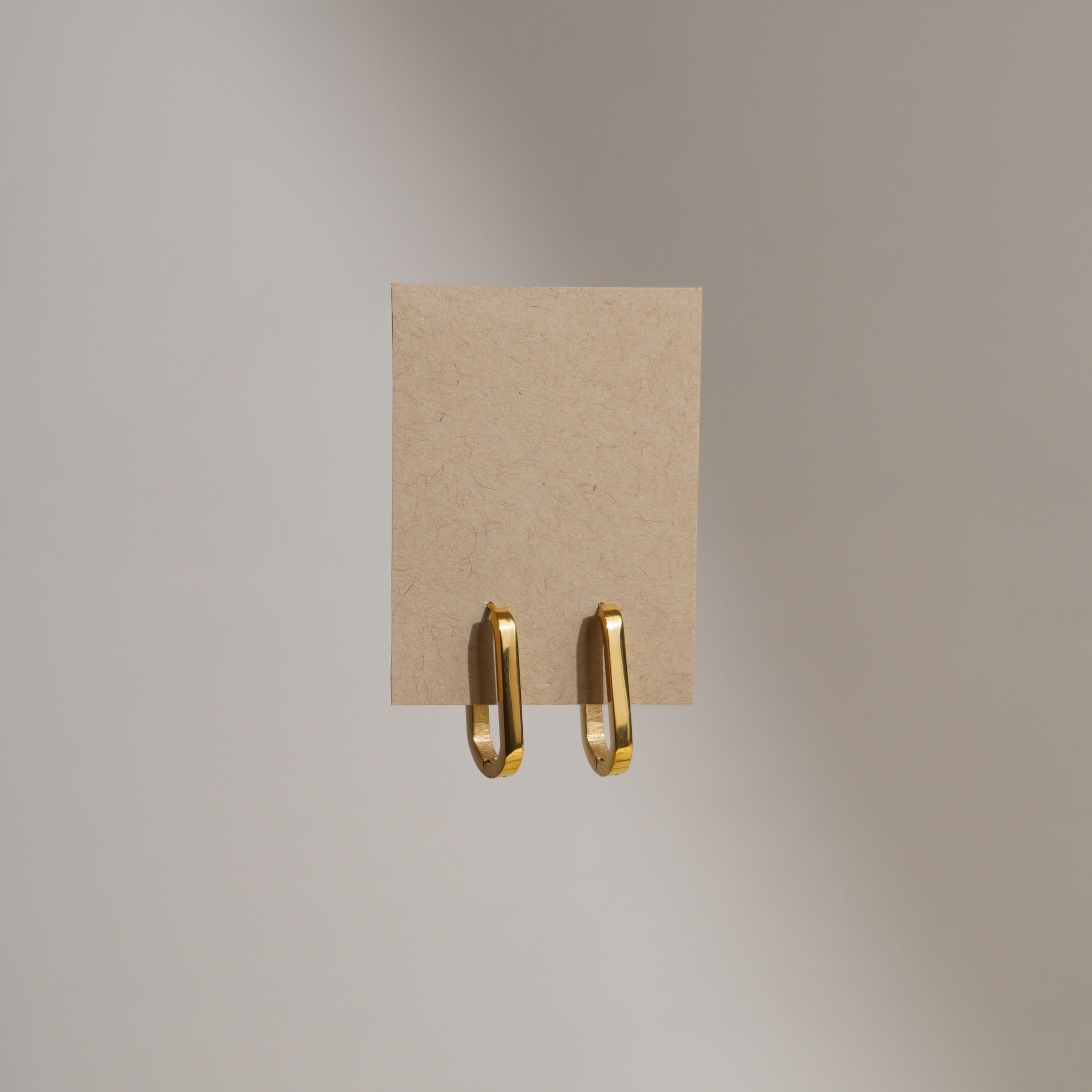 Gold Oval Huggie Earrings