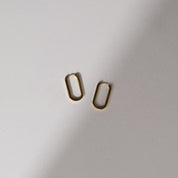 Gold Oval Huggie Earrings
