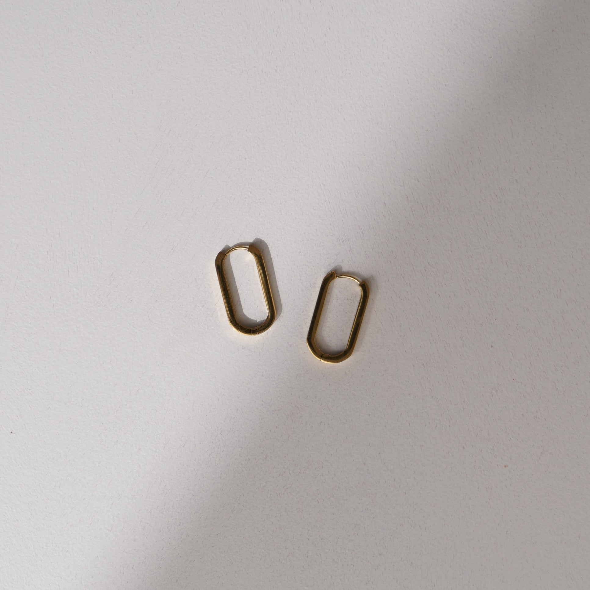 Gold Oval Huggie Earrings