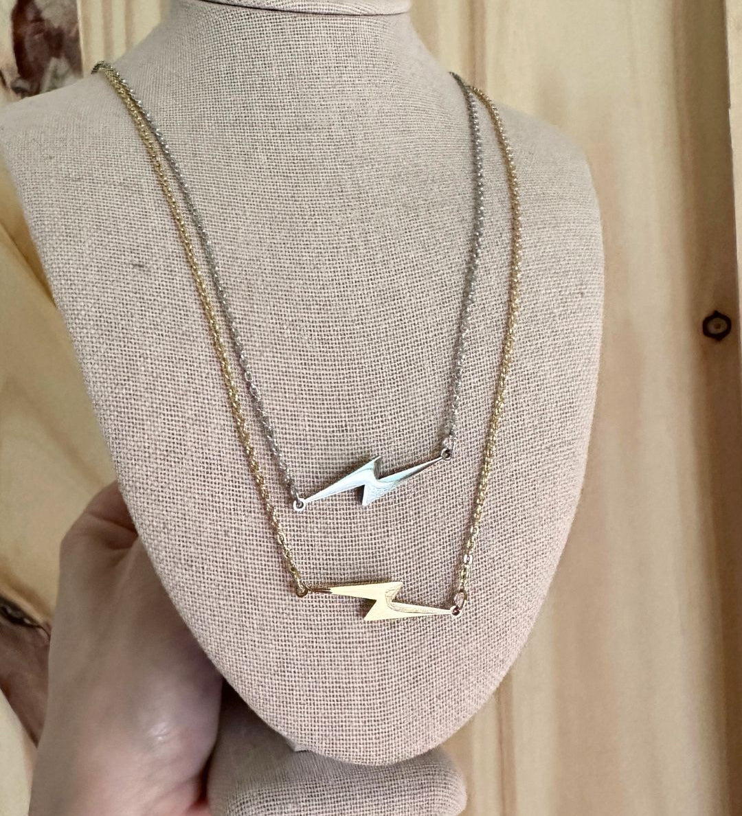 silver and gold lightning bolt necklaces
