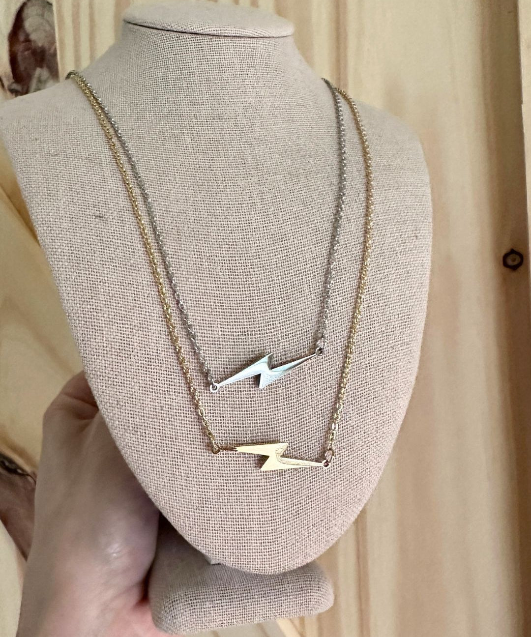 silver and gold lightning bolt necklaces